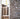 Stacks of cardboard tubes and poster rolls neatly organized on shelves in the Skew'd Art production area, showcasing the efficient packaging process for high-quality canvas prints and limited edition prints UK.